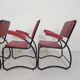 Set of 4 armchairs and a coffee table with tubular structure in Bauhaus style, 1950s.