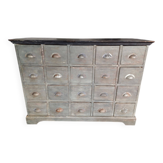 Furniture with 20 drawers and its shell handles