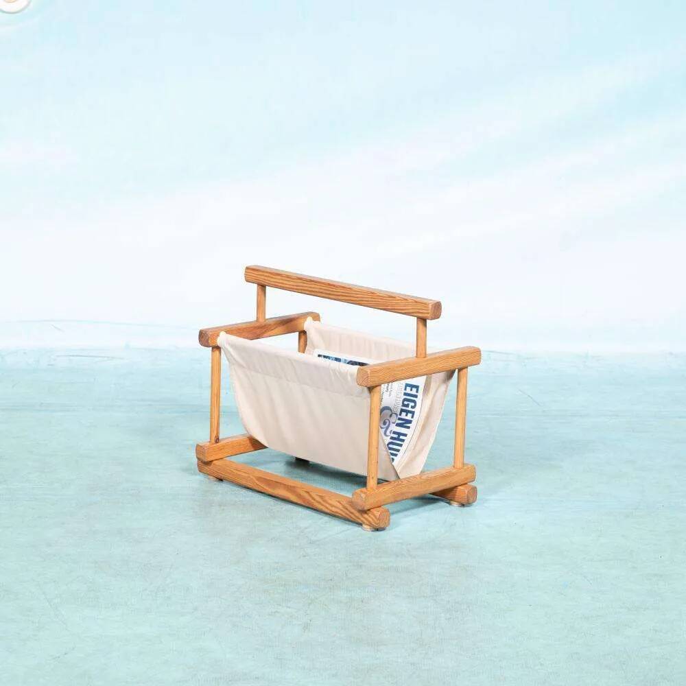 Bohemian magazine rack in vintage 70s pine style.