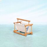 Bohemian magazine rack in vintage 70s pine style.