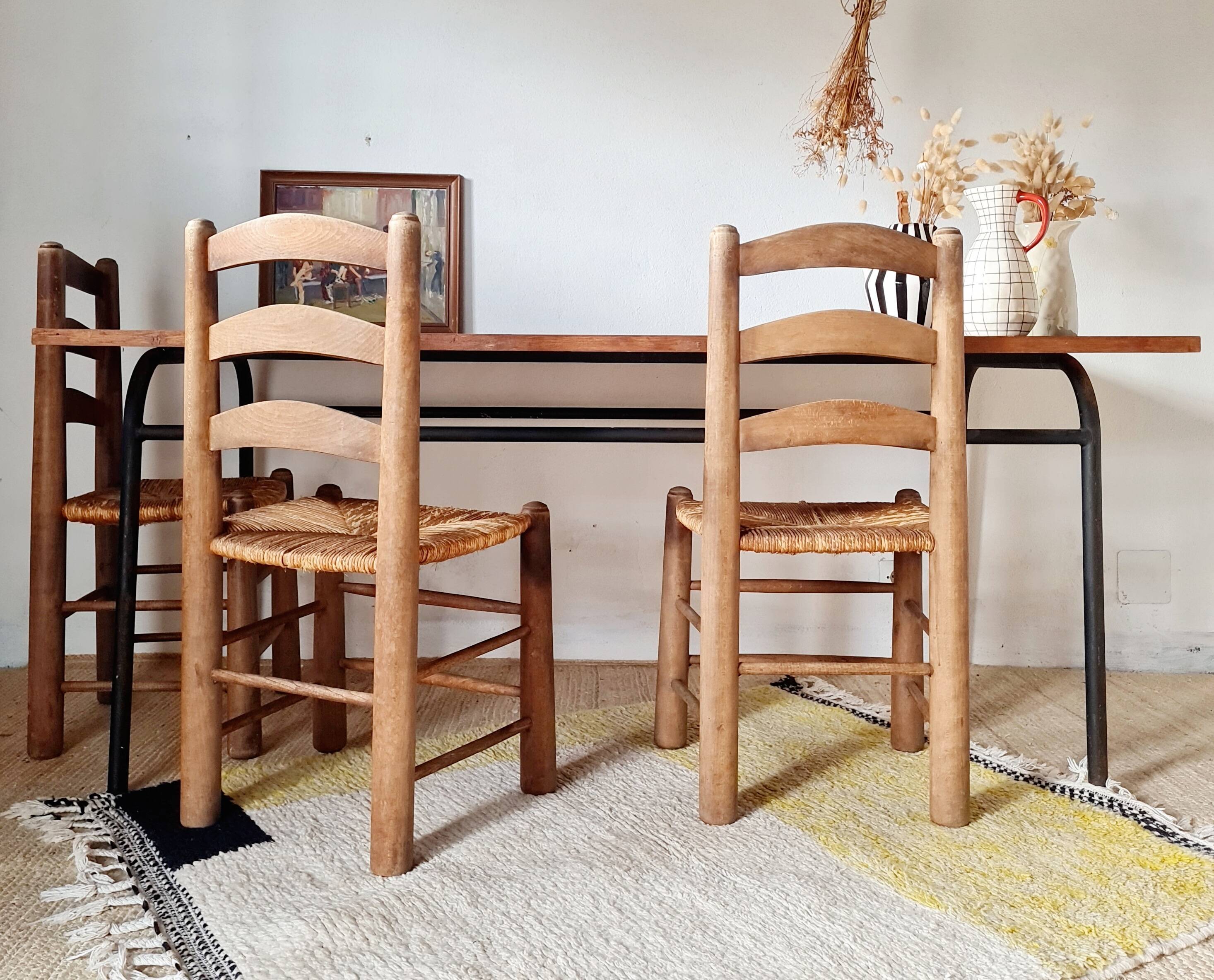 Metal tubular base table with a wooden top.