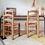 Metal tubular base table with a wooden top.