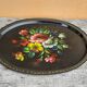 Black lacquered metal tray with multicoloured vintage Russian floral decoration.