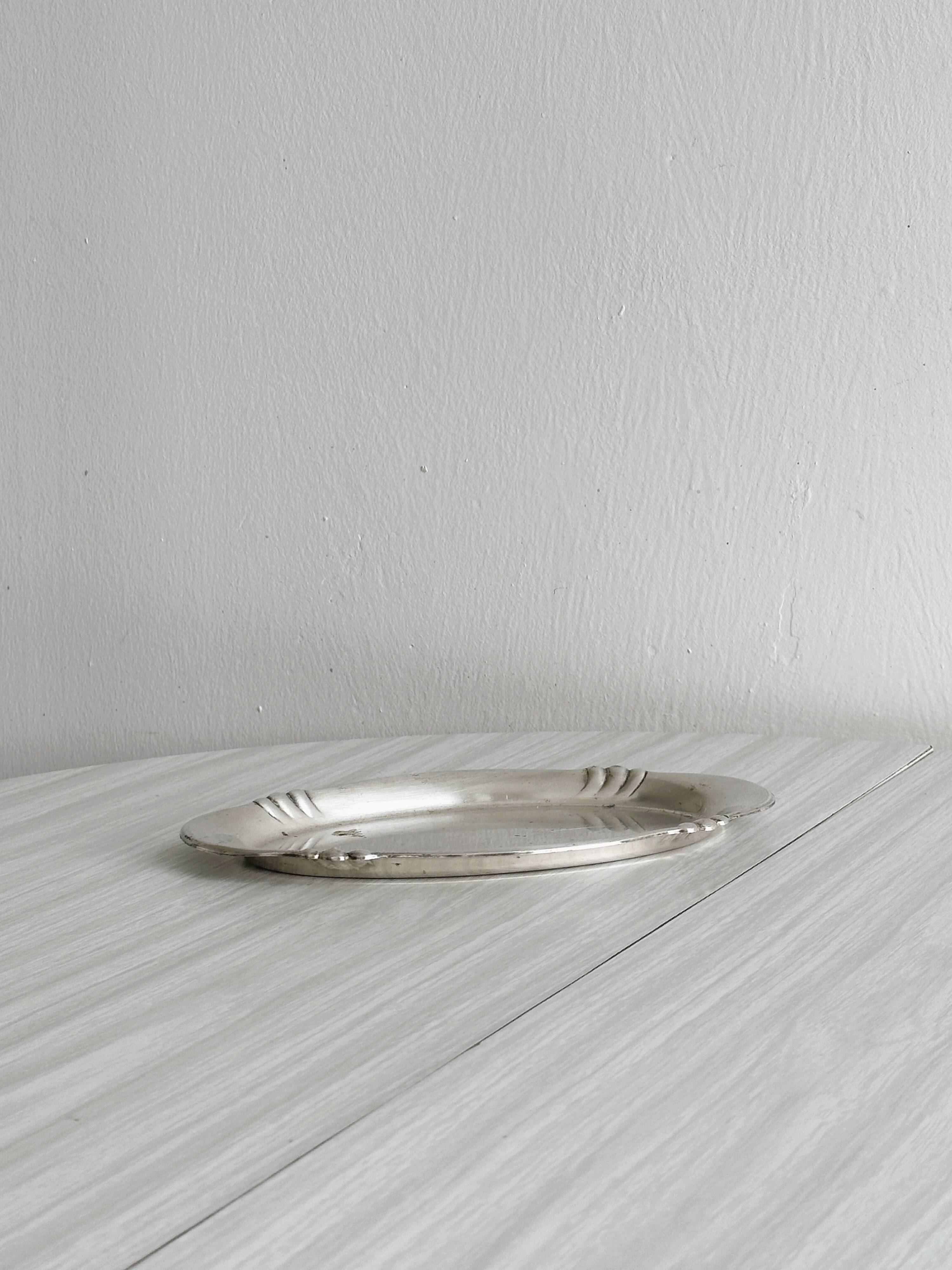 Small vintage tray in silver-plated light metal