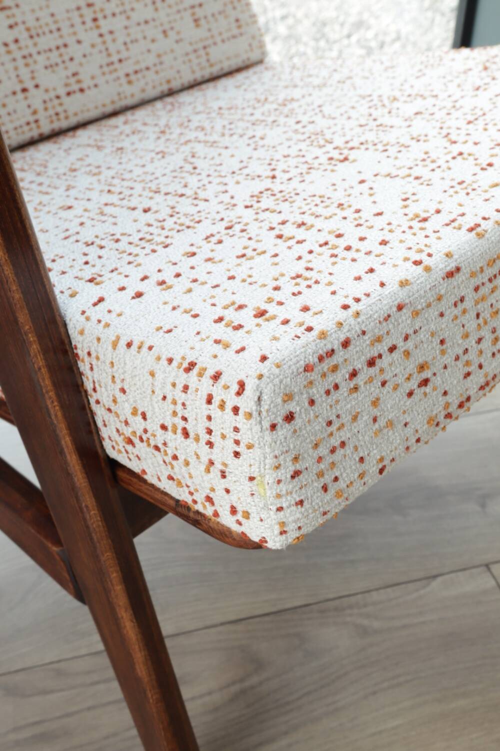 Vintage Danish boucle armchair with orange polka dots from the 1960s.