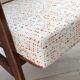 Vintage Danish boucle armchair with orange polka dots from the 1960s.