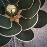 Flower wall light made of rattan and fir green linen