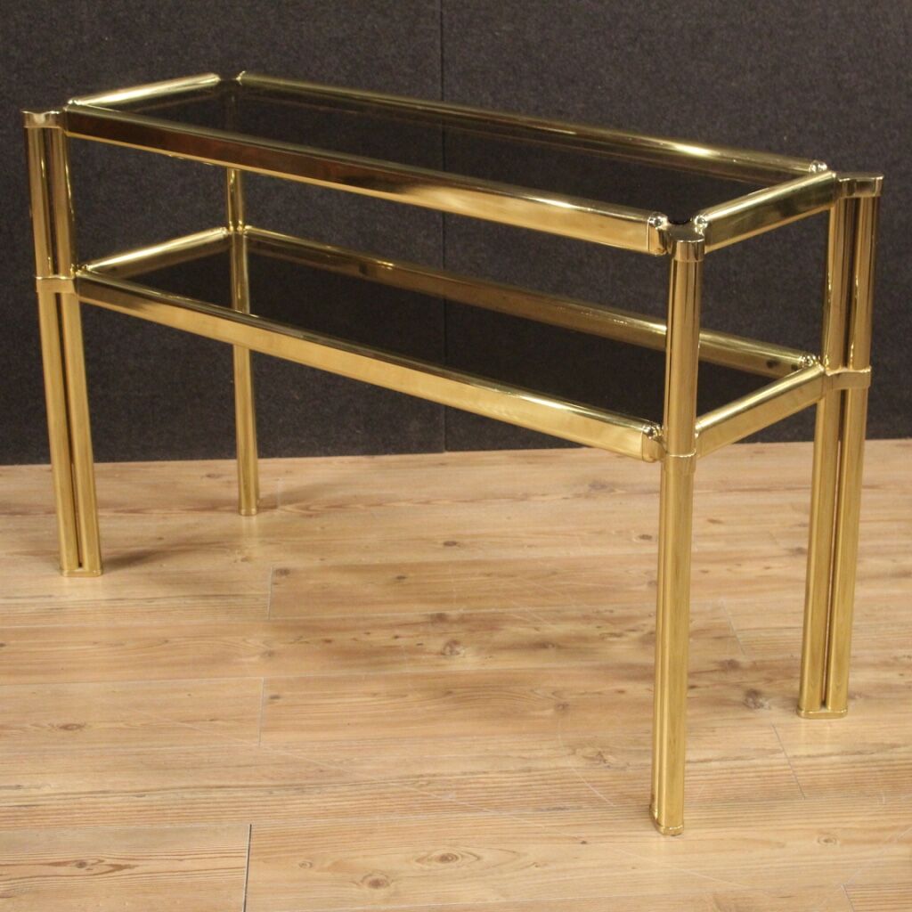 Italian console in gold metal