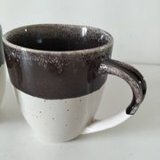 Set of three two-tone mugs, glazed stoneware, café workshop style.