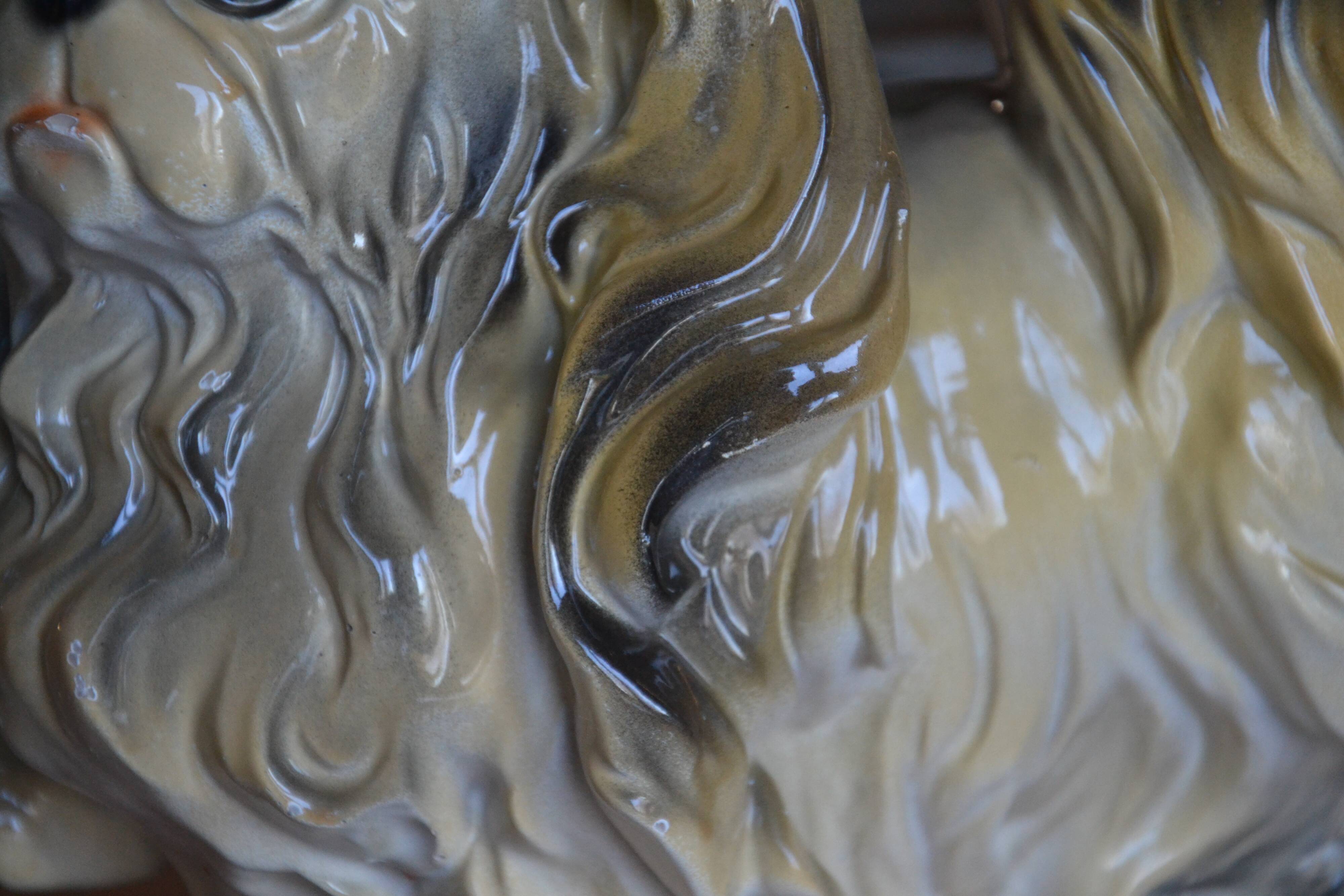 Ceramic dog sculpture from the 1940s-50s.