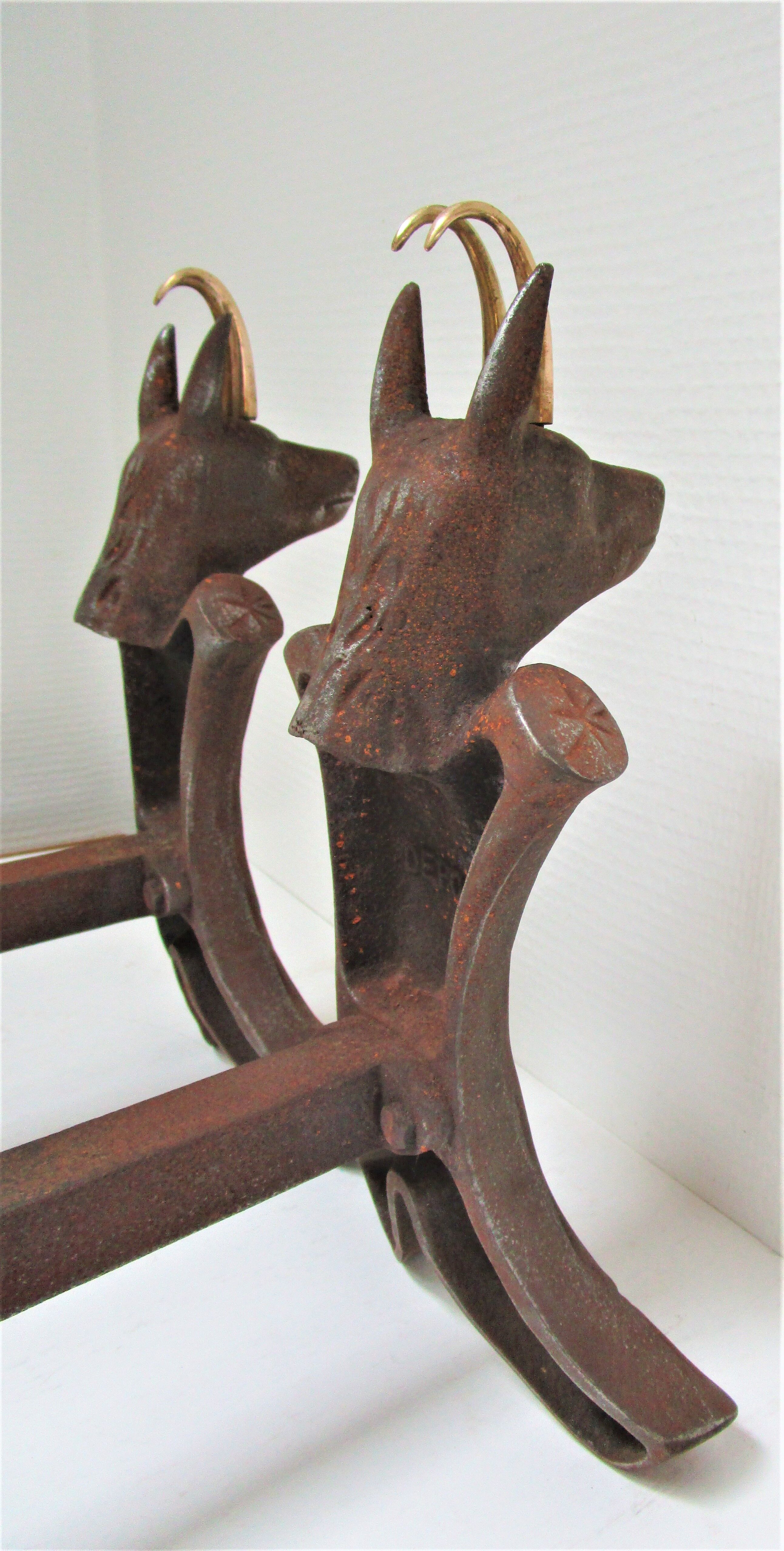pair of zoomorphic chenets cast iron brass vintage buff