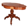 Large walnut guéridon with a sculpted base.
