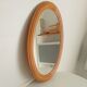 Vintage oval mirror in beech from the 70s/80s.