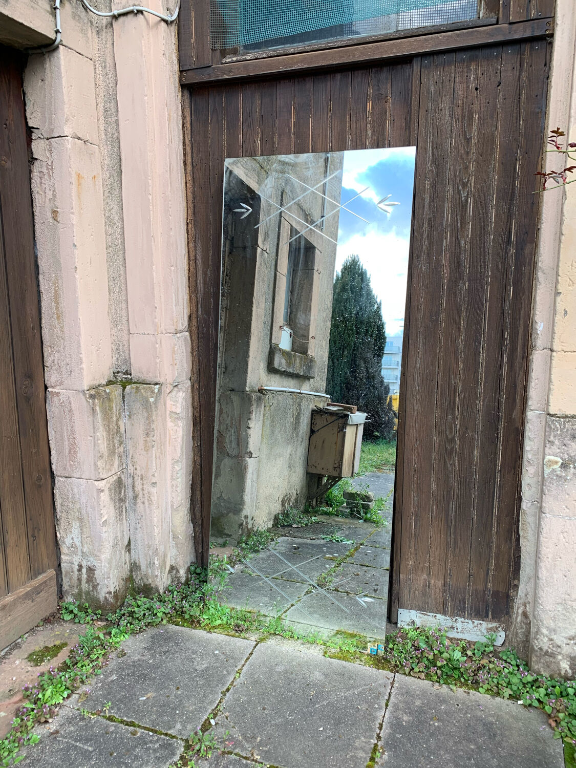 Marly brothers chiseled mirror in burgundy made in France 1950-1960