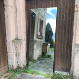 Marly brothers chiseled mirror in burgundy made in France 1950-1960