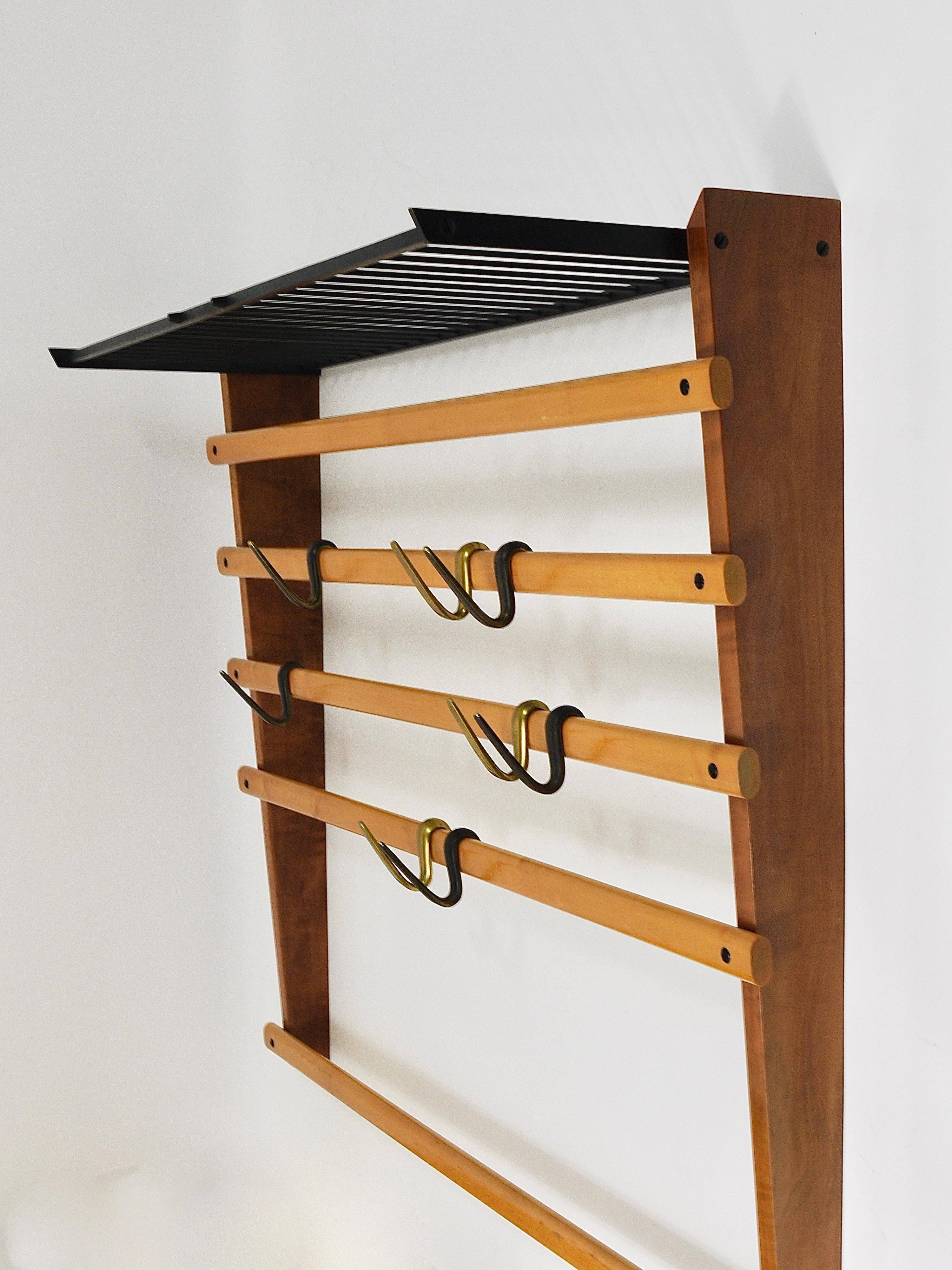 Rare coat rack by Carl Auböck with hat rack, cabinet, brass, walnut and beech, 1950s.