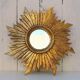 Miroir soleil en bois doré décoration vintage