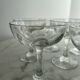 Set of seven blown glass stemmed glasses.