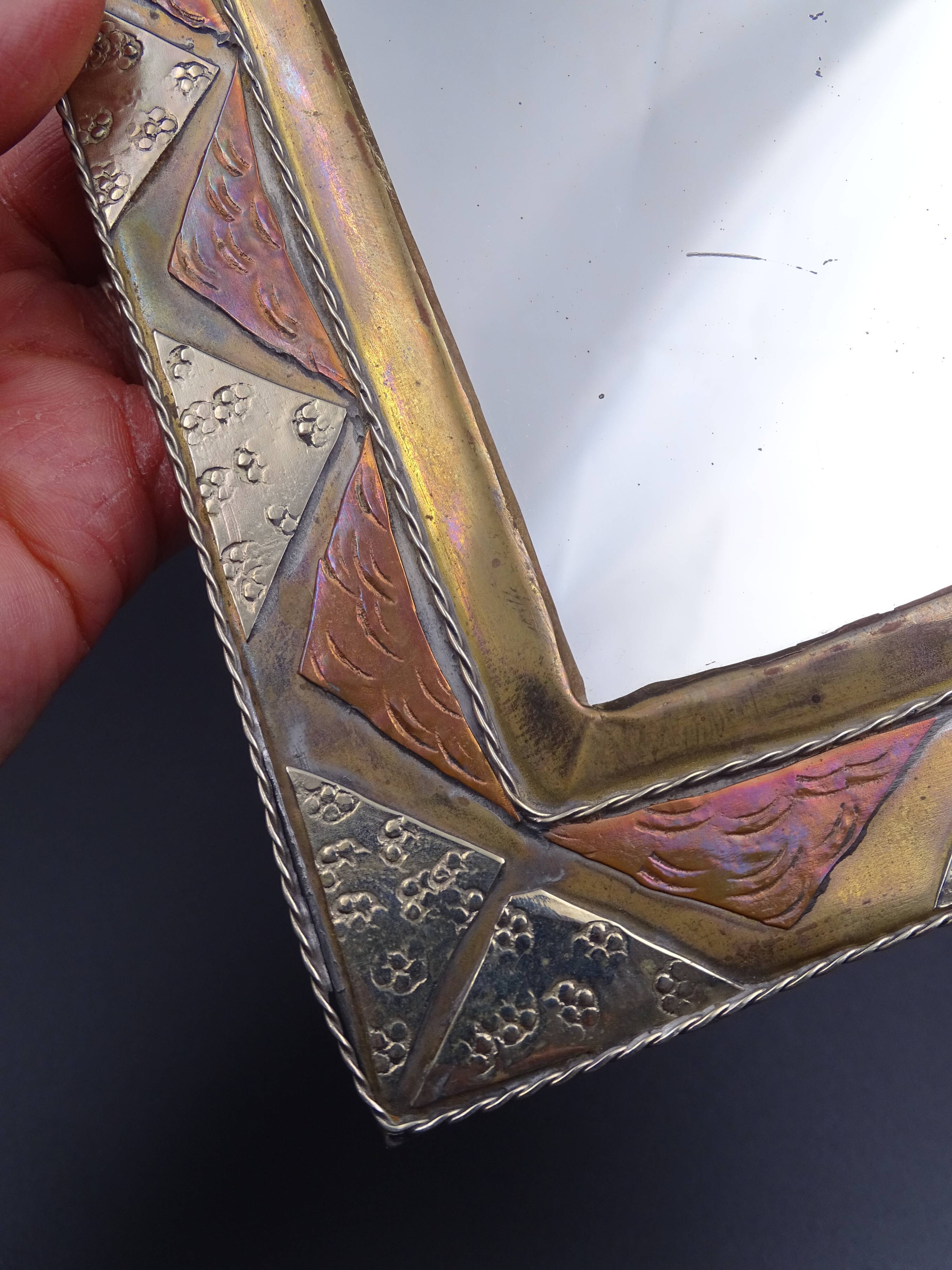 Oriental mirror in worked copper 24x15cm