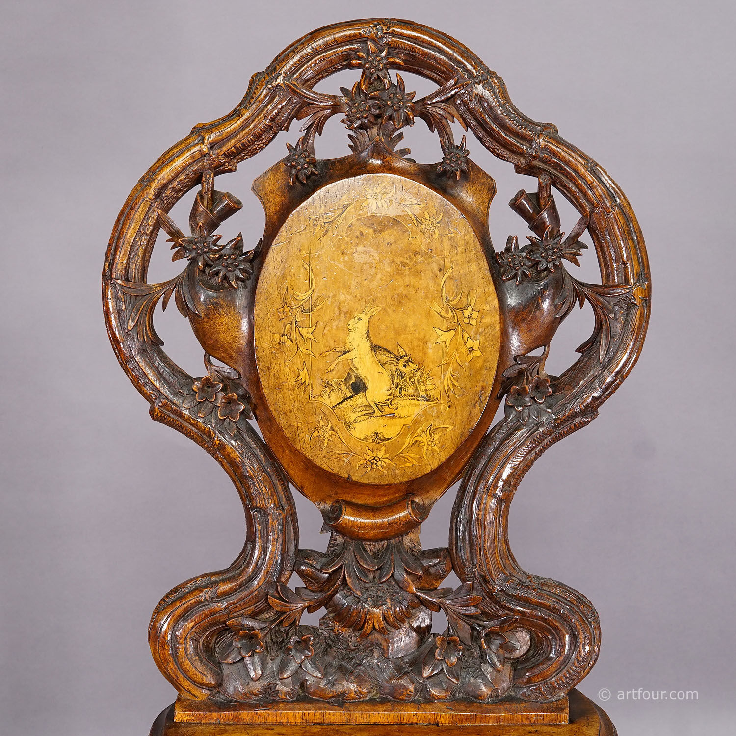 Pair of walnut chairs with Edelweiss marquetry, Brienz Switzerland 1900