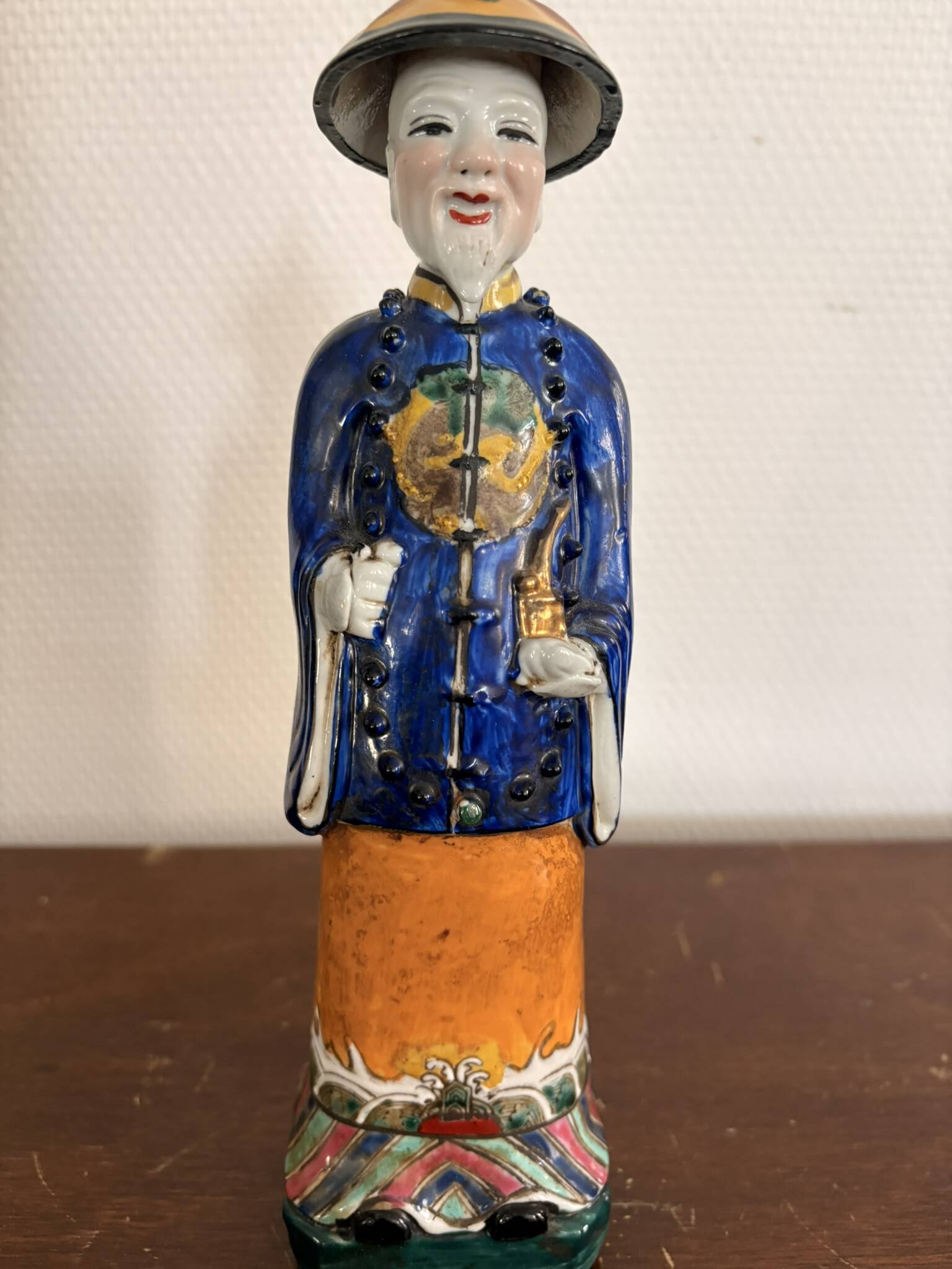 Chinese Porcelain Sculpture of a Manchu Mandarin Qing Pipe Smoker