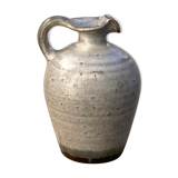 The pitcher / vase in ancient sandstone