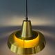Mid-century Danish style orange brass suspension light.