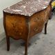 Commode galbée et marquetée style Louis XV
