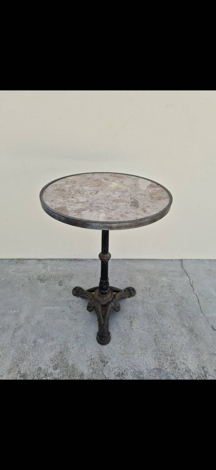 Pedestal table for restaurant bistro with lion paws and marble