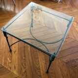 Iron coffee table forge on glass