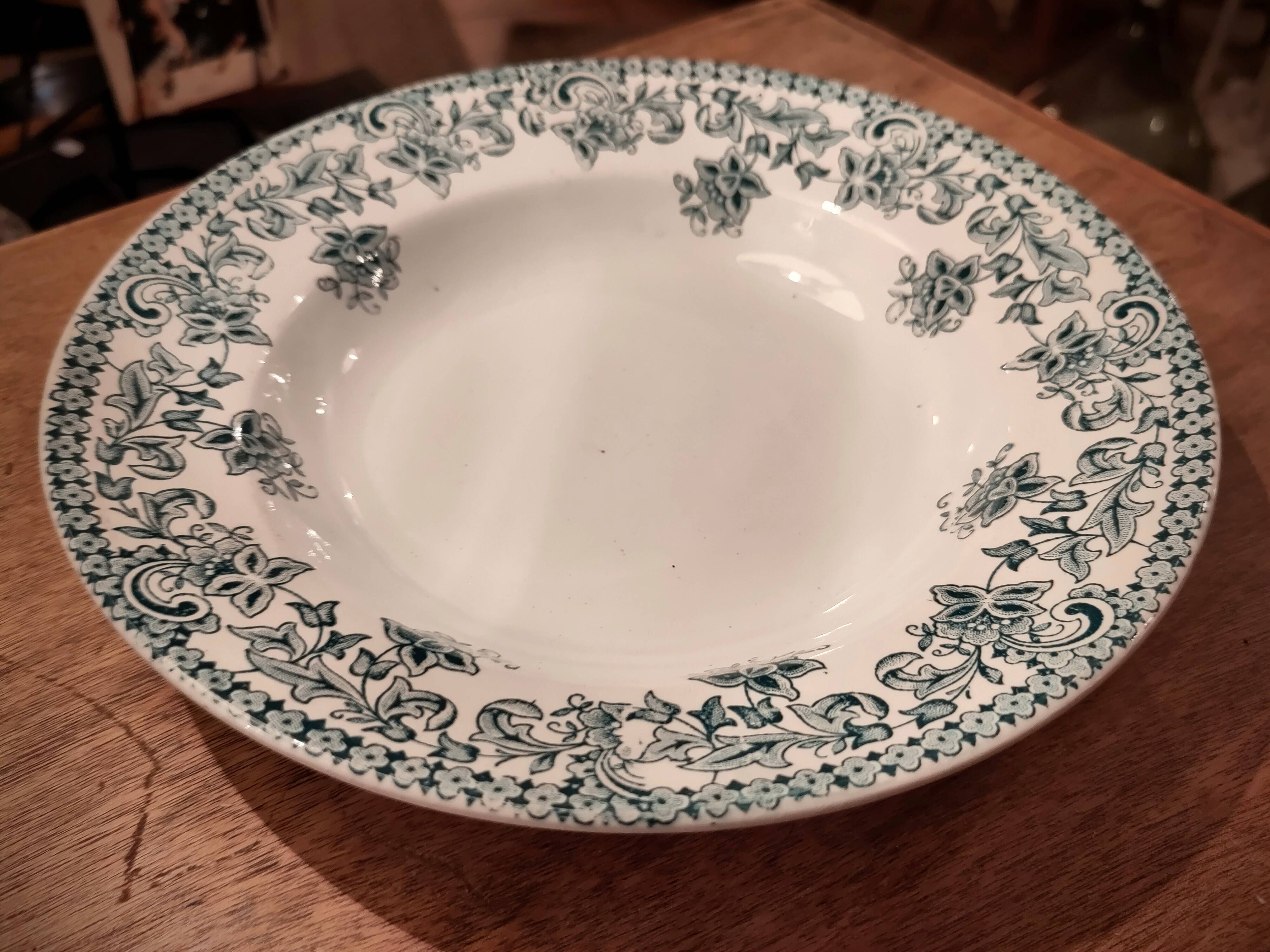 Four Saint Amand plates