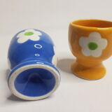 Pair of blue and yellow cockroaches with floral motifs