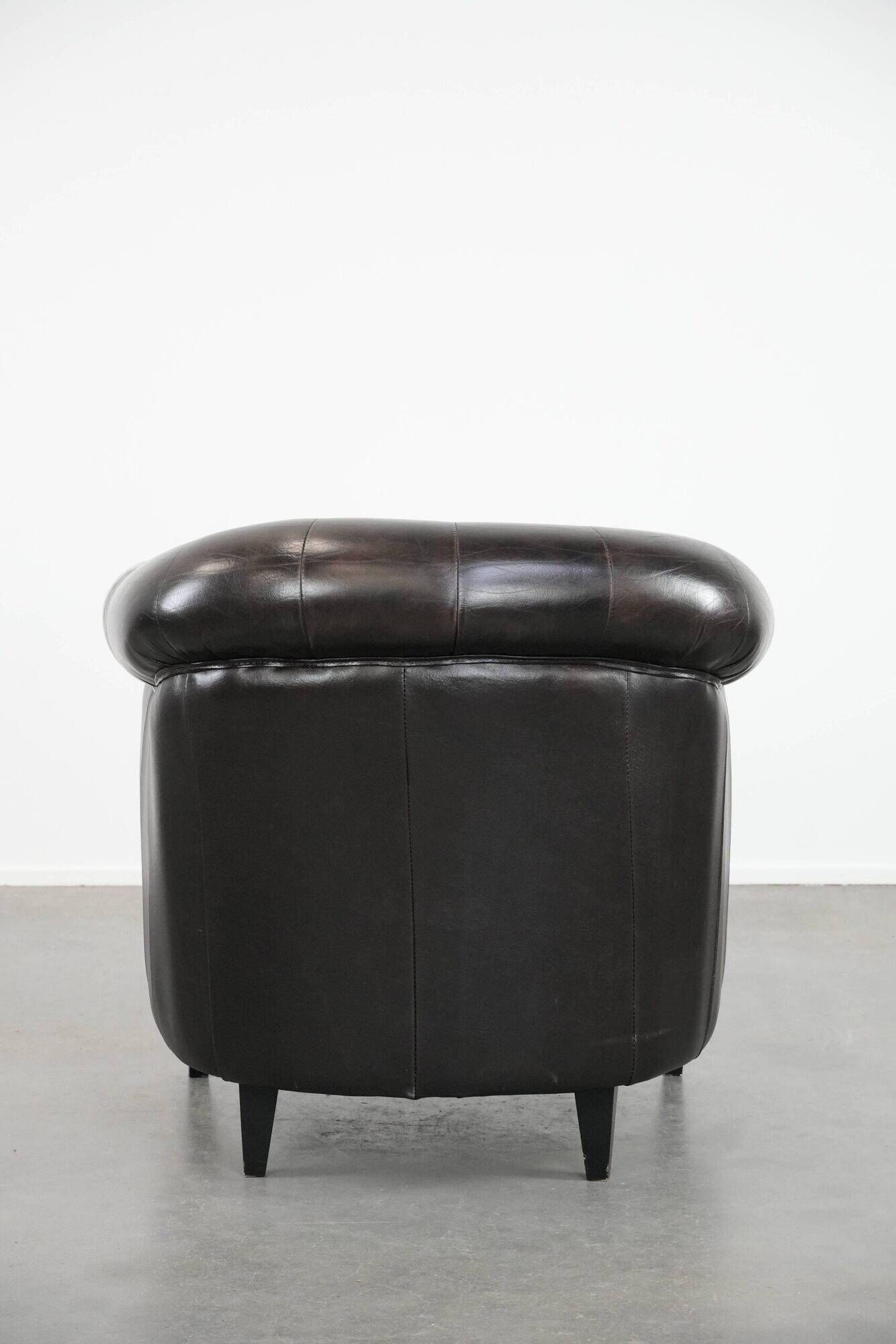 Luxury dark cowhide Chesterfield club armchair in English style