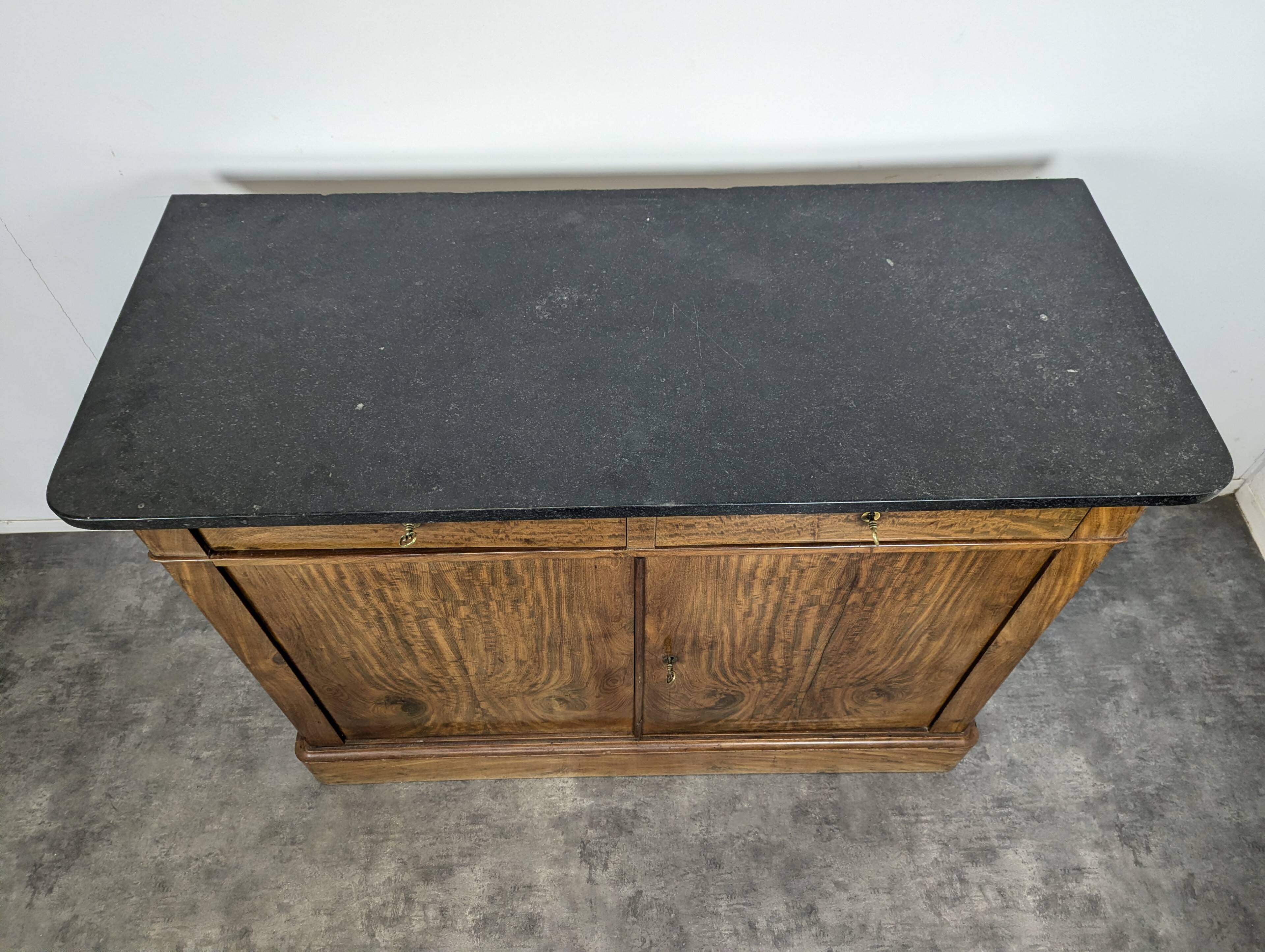 Louis Philippe two-door buffet in flame mahogany.