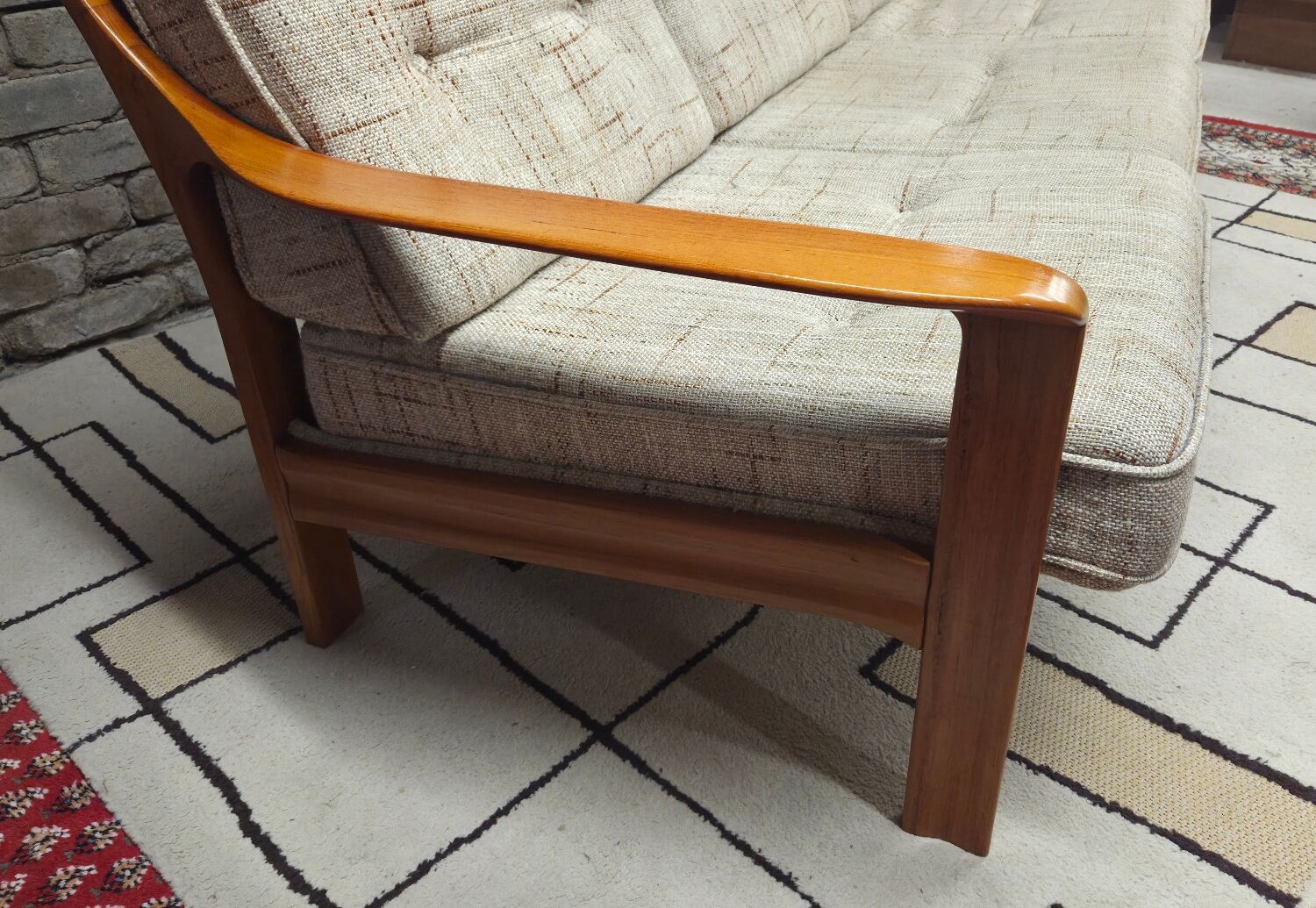 Danish canapé and its 1970s teak armchair