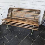 Old cast iron garden bench with oak slats