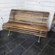 Old cast iron garden bench with oak slats