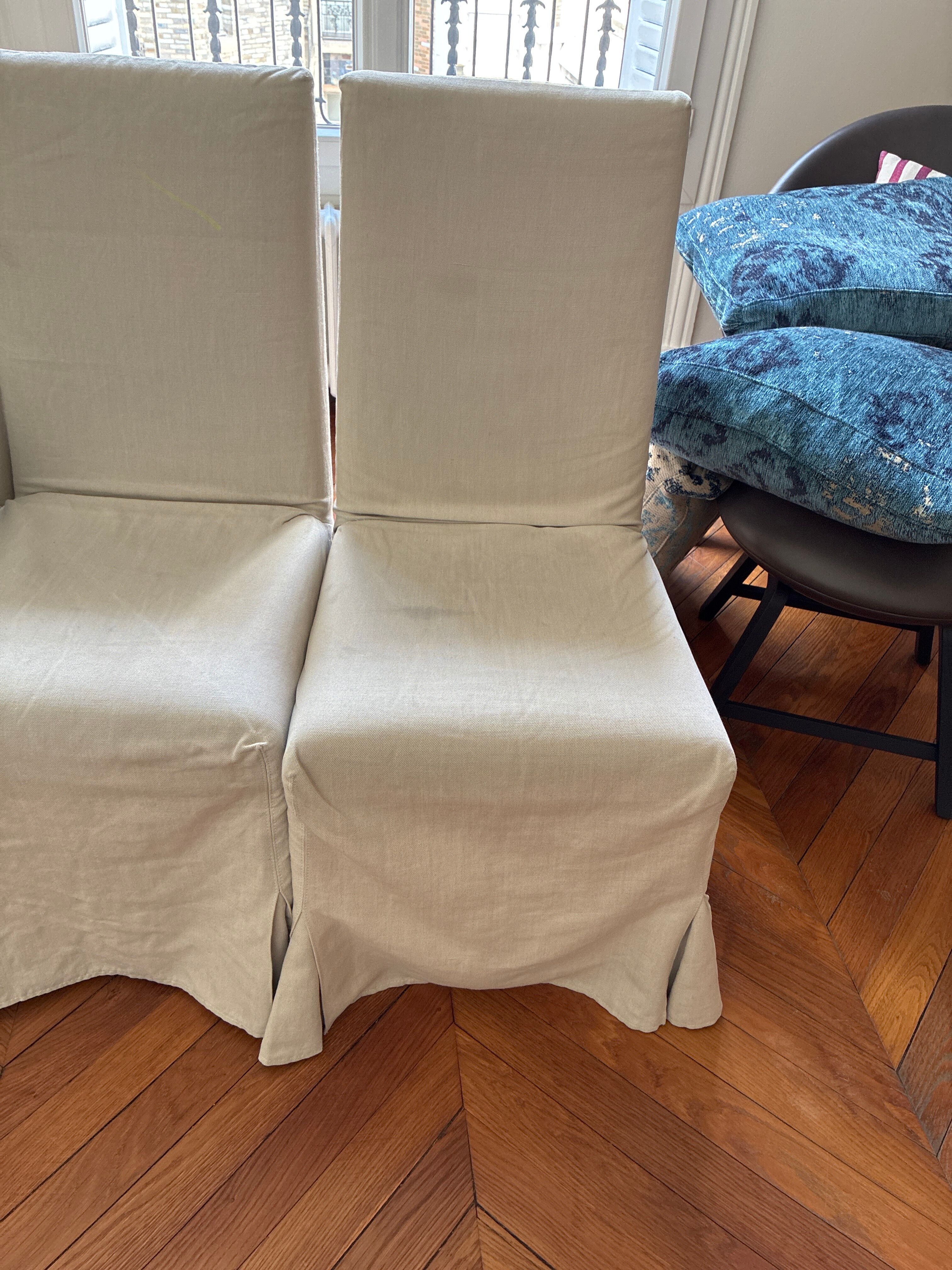 Set of 6 Maxalto chairs with covers.