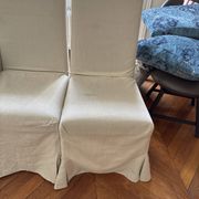 Set of 6 Maxalto chairs with covers.