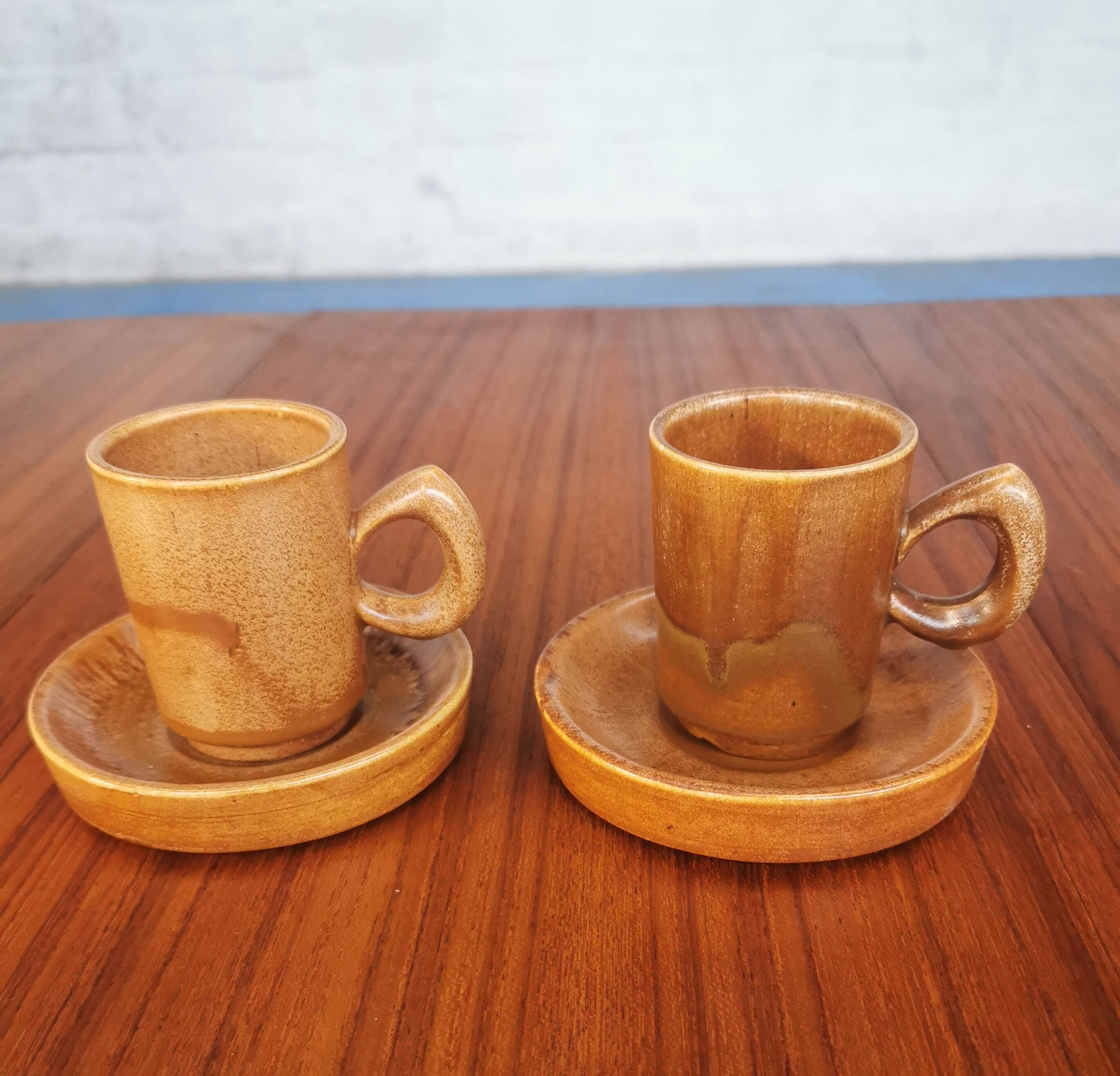 Duo of vintage stoneware cups