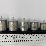 Series of 5 tin spice pots