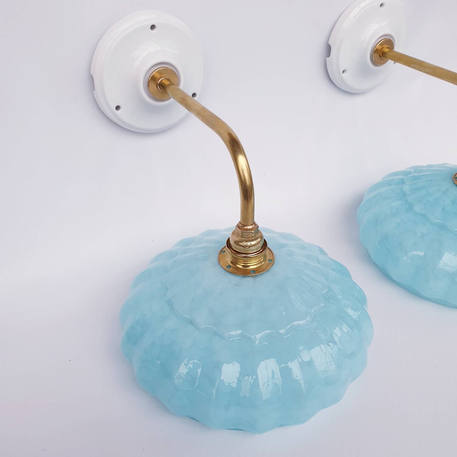 Swan neck wall lights and Clichy glass