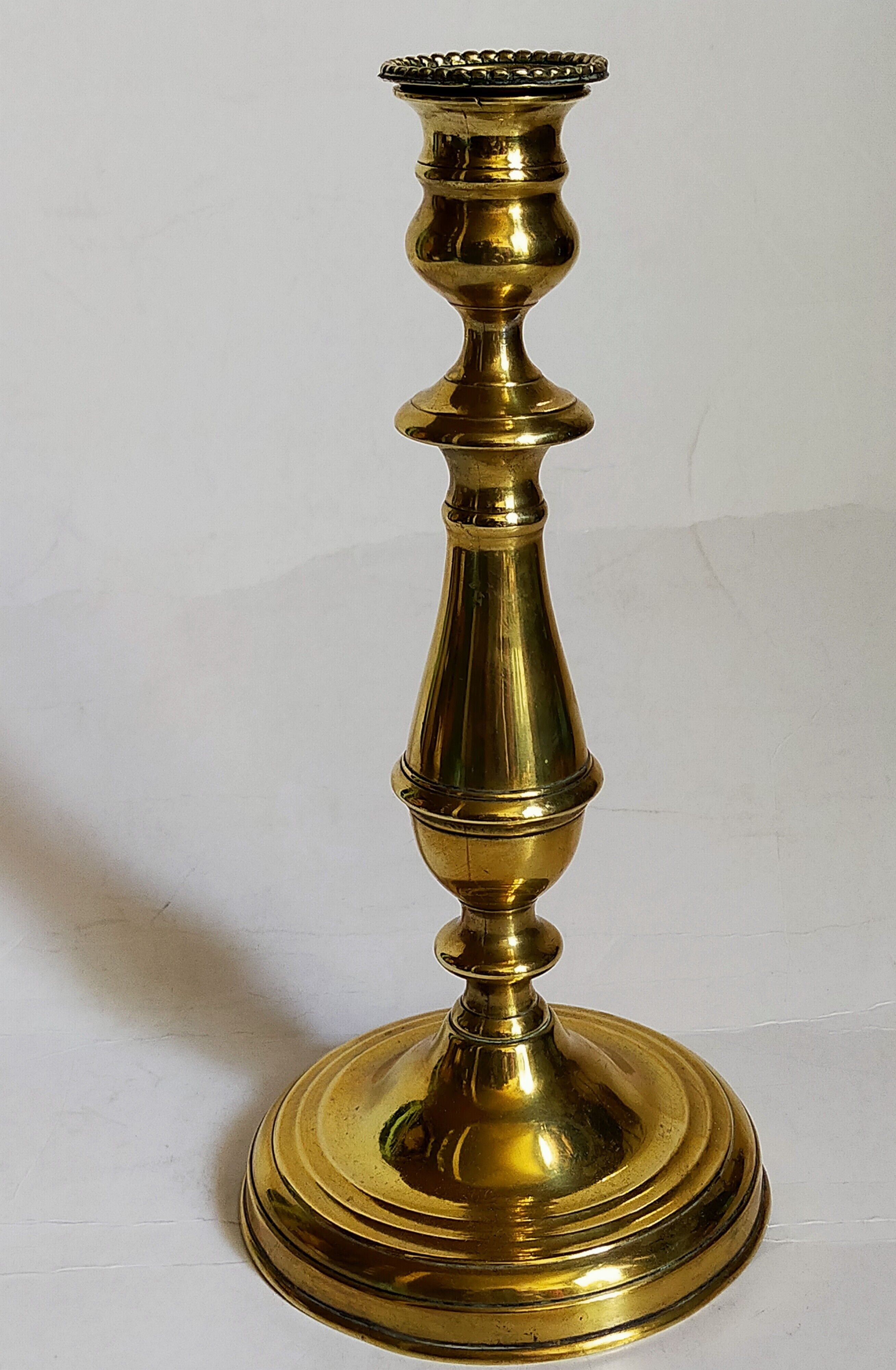 Old solid brass candle holder
