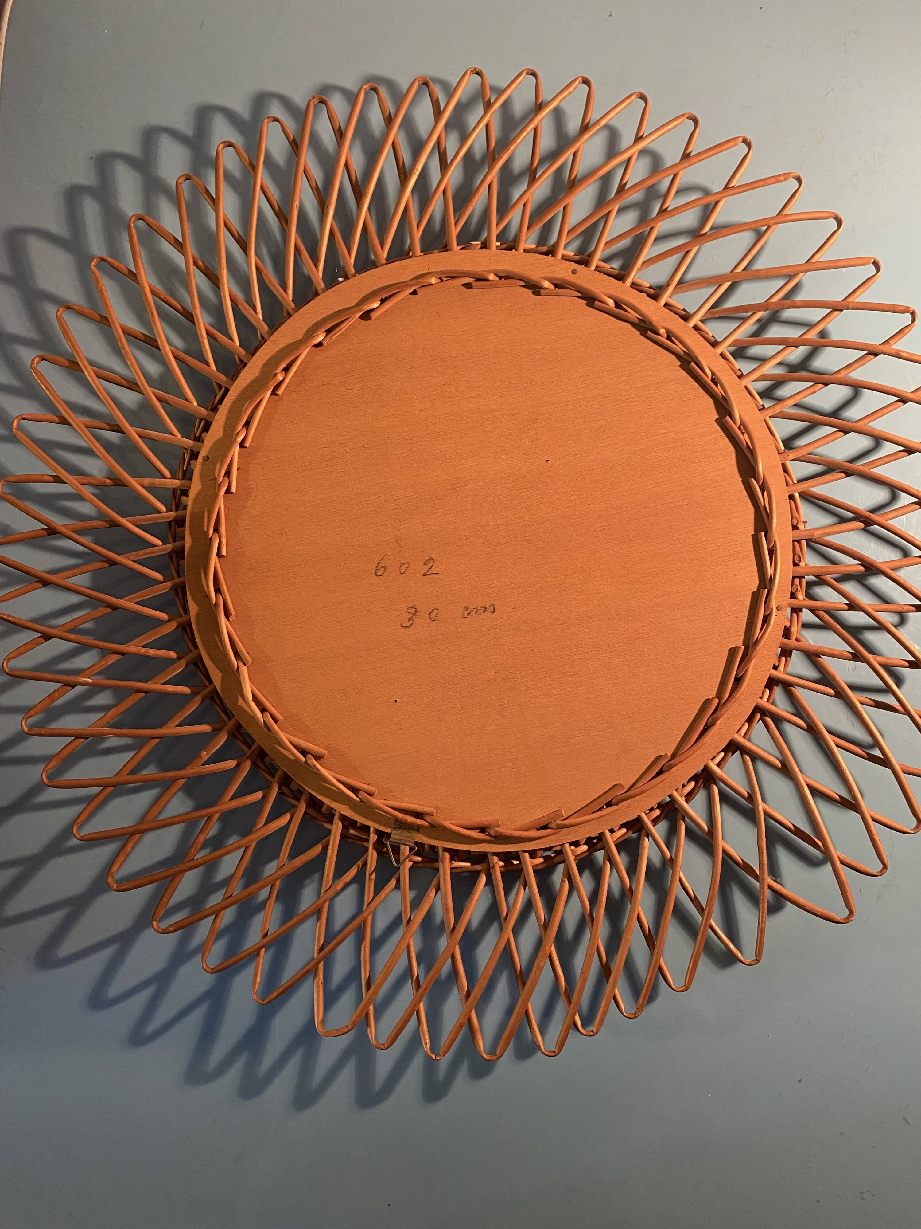 sun rattan mirror