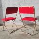 Pair of folding chairs in vintage red moumoute