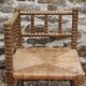 French antique turned wooden bobbin chair with rush seat