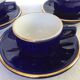 Lot de 3 tasses, soucoupes et d'un pot à lait bleues marine en porcelaine Delaunay