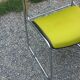 Set of 6 designer chairs with wooden seats and backs, chrome legs.
