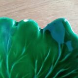 empty compartmentalized flat leaf-shaped pocket