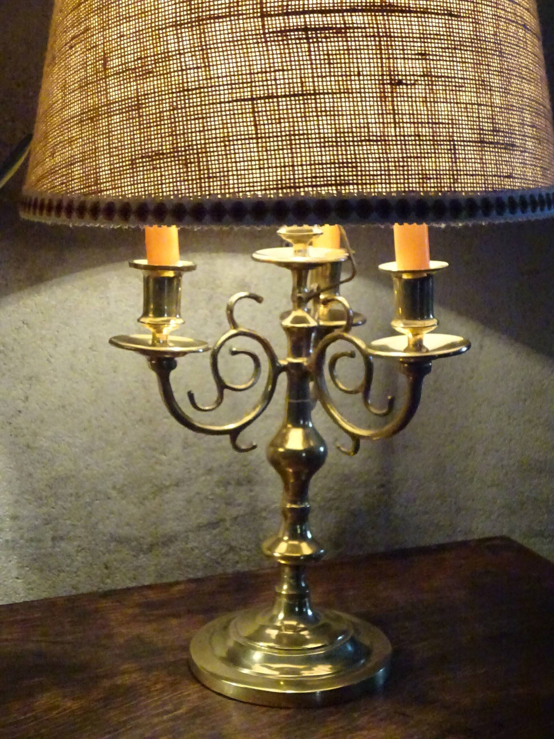 Copper candlesticks adapted as bedside lamps, the pair.